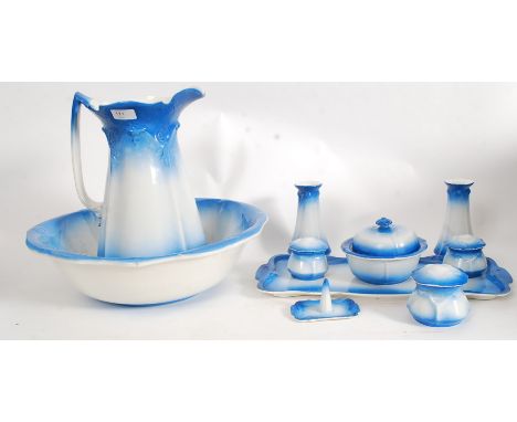 An early 20th century Staffordshire wash basin and jug, along with matching dressing table set in blush blue colouring.