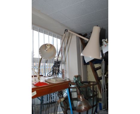 A Herbert Terry anglepoise style desk lamp raised on terraced base with pendant shade in beige together with another