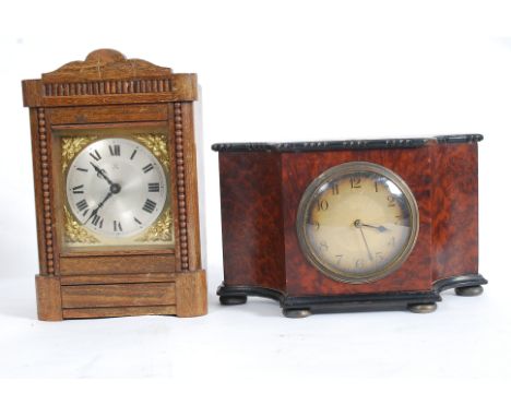 A 1940's French walnut cased mantel clock having engine turned face with 8 day brass movement