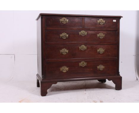 A Georgian 19th century mahogany chest of drawers. Raised on bracket feet with 2 short drawers over 3 graduating deep drawers