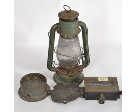 MIXED LOT: A mixed lot to include a vintage oil lamp, industrial light, vintage Harding Rhodes machine counter, and machine p