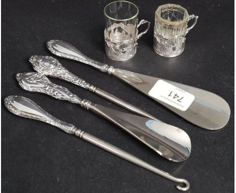 A collection of hall marked silver items to include Toddy cups, spoons etc please see images