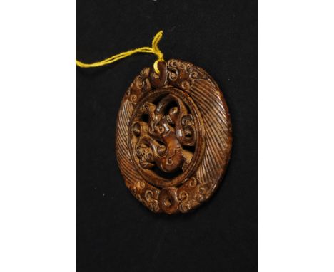 A detailed carved Jade Bi