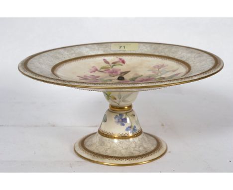 A Victorian Royal Worcester Tazza having a floral spray bearing purple back stamp dating to  1881 along with registration loz