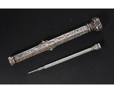 A beautiful silver twin propelling pencil in the manner of Samuel Morden being chase rococo decorated having inset agate ston