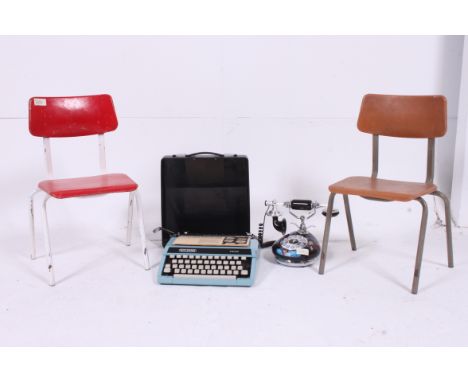 2 1950's painted retro childs chairs together with a portable retro typewriter and an Elvis telephone. Measures: 54cms chairs
