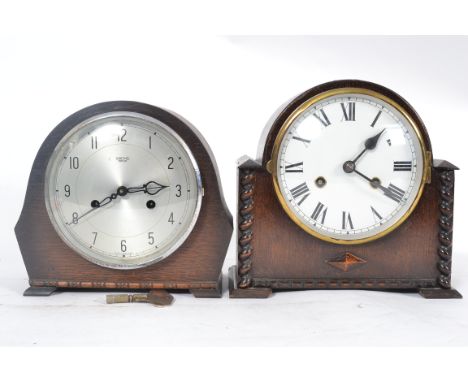 A 1930's 8 day mantel clock having 8 day movement with arched case together with a Smiths oak cased mantel clock