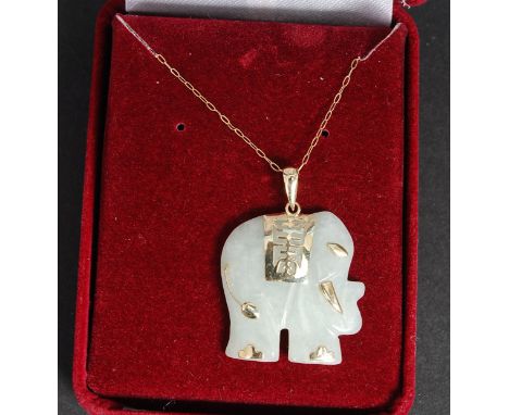 A 9ct gold and jade elephant shaped necklace