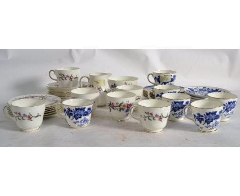 A Wedgwood ' Devon Sprays ' part tea service together with another Wedgwood blue and white tea service and a set of Copeland 