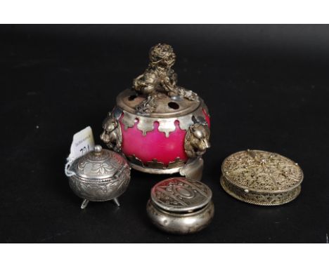 A collection of three white metal (one marked ' 800 ' indicating silver ) snuff pots / trinket pots etc.