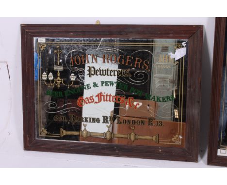 A good large 20th century advertising mirror set within an oak frame bearing  the details for ' John Roberts Pewterers of Bar