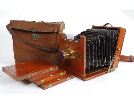 A Victorian mahogany cased plate camera by Dervax together with a wooden tripod