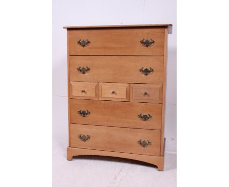 A mid 20th century light mahogany Stag Minstrel tallboy chest of drawers. Raised on bracket feet with upright chest having go