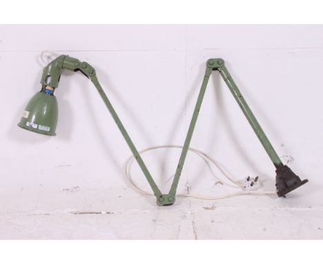 An original 1930's Art Deco Industrial Anglepoise lamp in green on angled arm with pendant shade, taken from the Douglas Moto