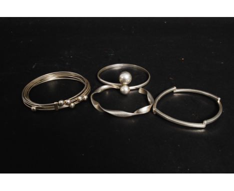 Four silver hallmarked and white metal 925 bracelets.