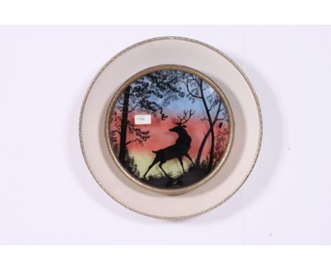 A retro glass fronted light with coloured background and frontal glass depicting a deer woodland scene. Measures: 10cms W x 4