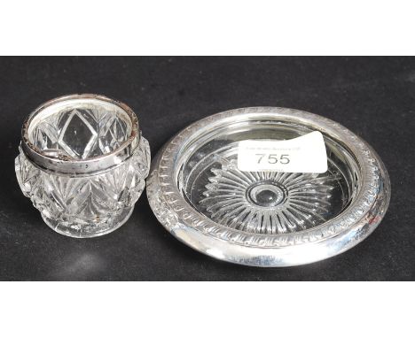 A silver collared 20th century cut glass ashtray together with a silver collared conserve jar together with hallmarked spoon