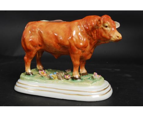 A Victorian style ceramic figure of a prize bull