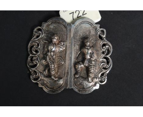 A white metal (unmarked, but likely silver ) belt buckle depicting Indian figures. 730g