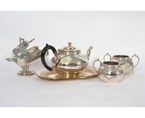 A silver plate service to  include  teapot, sugar bowl, creamer & salver tray etc. Measures: 15cms largest.