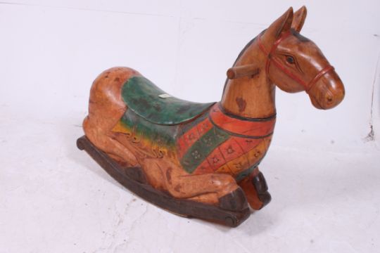 carved wooden rocking horse