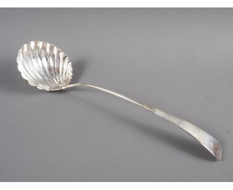 A Georgian silver punch ladle with scallop shell bowl, 4.5oz troy approx