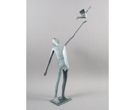 †Terence Coventry: a patinated bronze figure, "Man releasing bird", 1/10, 21" high †ARR - Artist's Resale Right: This lot may