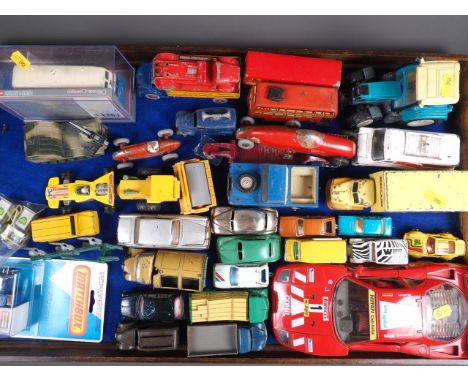 A Corgi Toys die-cast model Whizz Wheels Rolls Royce Silver Shadow, a Dinky Toys model Maserati, a Burg model 1987 Ferrari F4