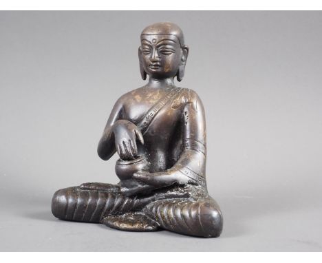 A patinated bronze figure of Buddha, 5" high