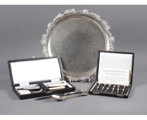 A set of six silver cocktail sticks, modelled after Charles Dickens Characters, in fitted box, a silver and mother-of-pearl f