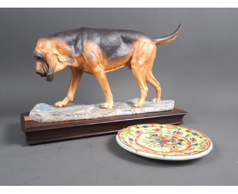 An Albany Fine China model Bloodhound, on wooden stand, modelled by Neil Campbell, 14 1/2” long x 9 3/4” high, and a Continen