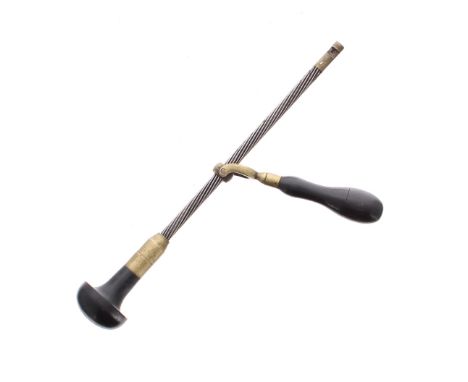 Archimedes drill, the spiral shaft of steel with a brass mounted ebony handle, the reciprocating collar also with a brass mou