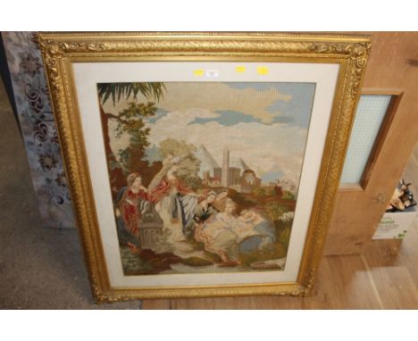 A Victorian gilt framed needlework tapestry depicting the Discovery of Moses, from the Banks of The Nile 