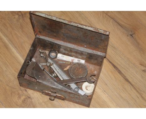 A small metal Wolf tool box containing miscellaneous tools  