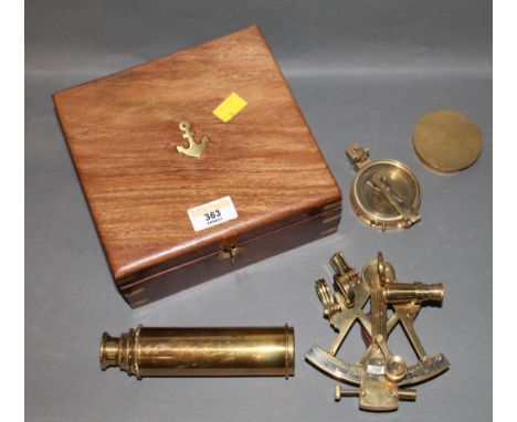 A modern reproduction cased sextant and telescope set within a brass inlaid hardwood box 