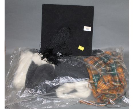 A vintage black felt university "Mortar board" by J Clippell, a Clippell &amp; Co Ltd,  a university cape, a cummerbund, a bo