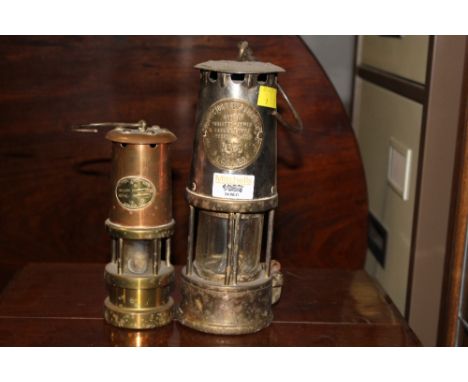 Protector lamp and lightening Co type 6 miners lamp No.164 sold together with a Hetton Coal and Mining Company miners lamp in