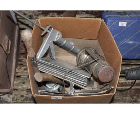 A box of miscellaneous tools
