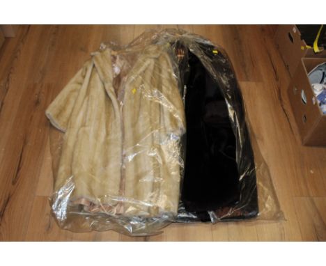 A vintage simulated mink fur coat, (size unknown), together with another simulated dark fur coat (size unknown)