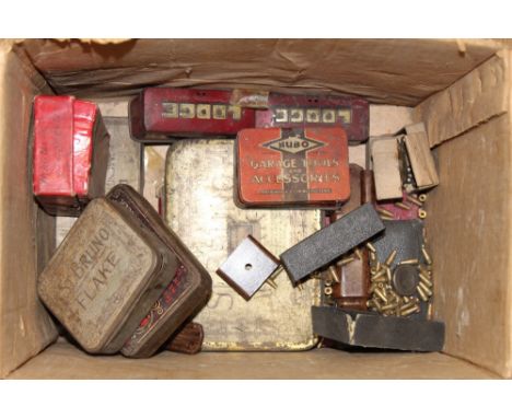 Selection of vintage tobacco tins containing various engineers and millinery items