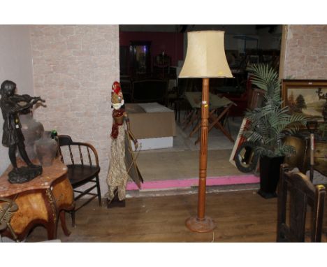 A late Victorian pale oak fluted standard lamp with later fitment and shade, 180 cm high (shrinkage split to base)