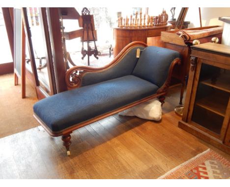 A Victorian sofa  upholstered in blue fabric, raised on legs with castors. H: 80cm L: 175cm