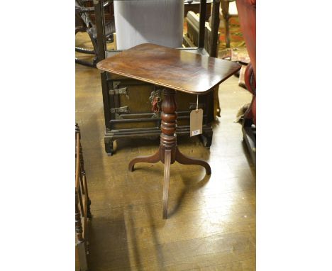 A 20th century mahogany side table, on a tripod base. H: 72cm