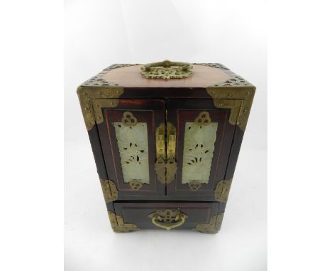 A 20th century brass-bound jewellery casket, having jade panel inserts, together with a miniature oak wardrobe. 