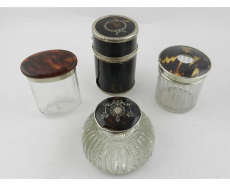 Three silver and tortoiseshell mounted jars and an inkwell. 