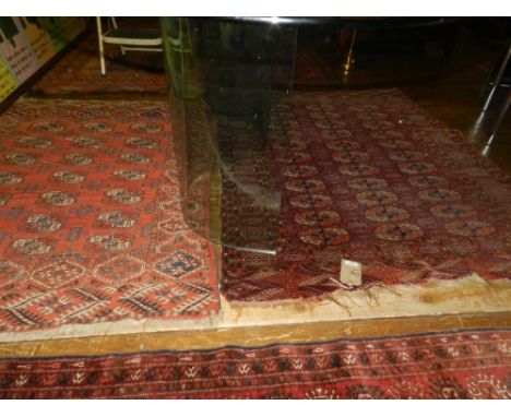 A red ground Afghan carpet, together with one other smaller carpet. L: 165cm W: 28cm