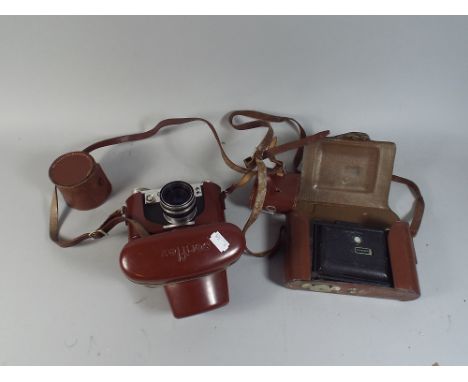 A Vintage Leather Cased Corfield Periflex 3 Camera, Light Meter and Lens Cover Together with Leather Cased Kodak Camera.