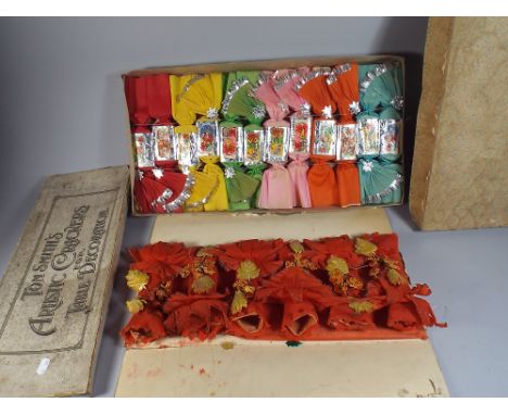 A Set of Edwardian Artistic Crackers for Table Decoration by Tom Smith and A 1950's Set of Christmas Crackers.