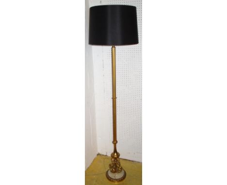 STANDING LAMP, 20th century gilt metal and white marble with black shade and dolphin supports, 155cm H x 40cm.