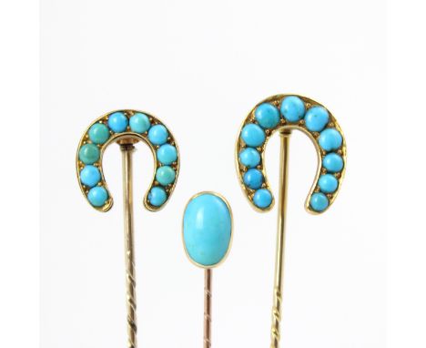 An early 20th century turquoise set stick pin, the horse shoe shaped stick pin with eleven graduated cabochon stones, closed 
